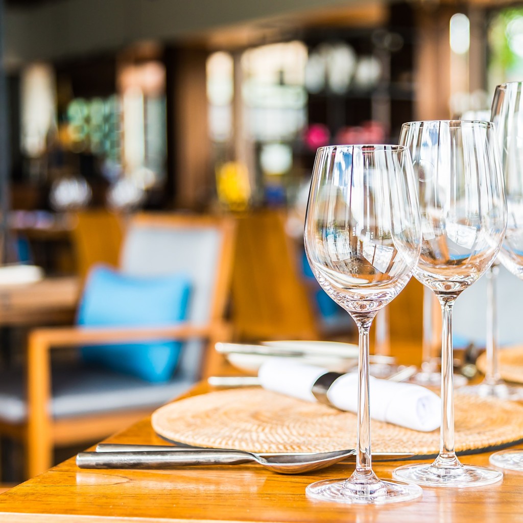 Selectiv soft focus on Wine glass on dining table in restaurant